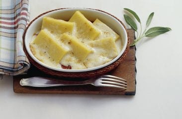 Polenta casserole with tomato sauce and cheese