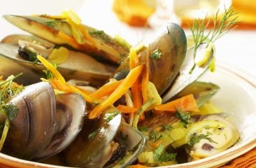 Green shell mussels in vegetable broth Green shell mussels in vegetable broth