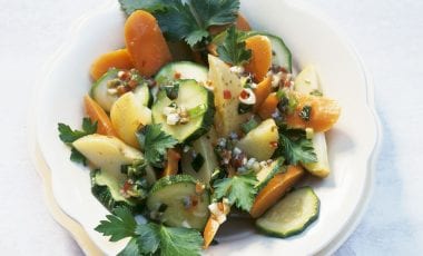 Warm potato salad with courgette, carrots and anchovies