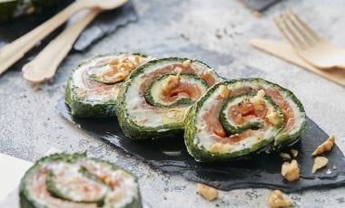 Spinach roll with cheese and salmon
