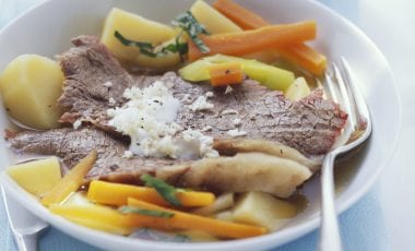 Boiled beef with vegetables, potatoes and horseradish sauce