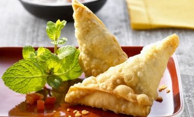 Lamb dumplings with tomato dip
