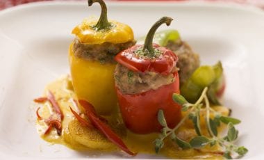 Small pepper with stuffing and pumpkin sauce