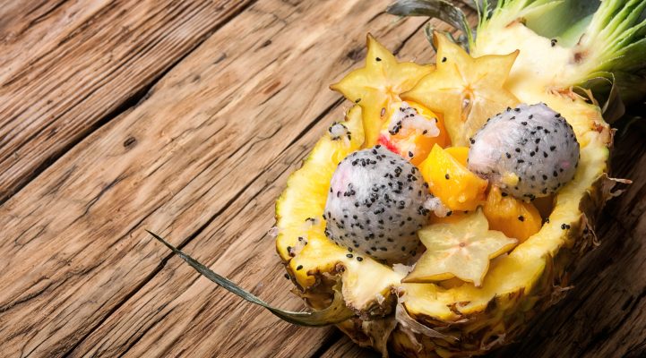 Pineapple with fruit salad inside