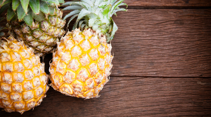 Pineapples on table