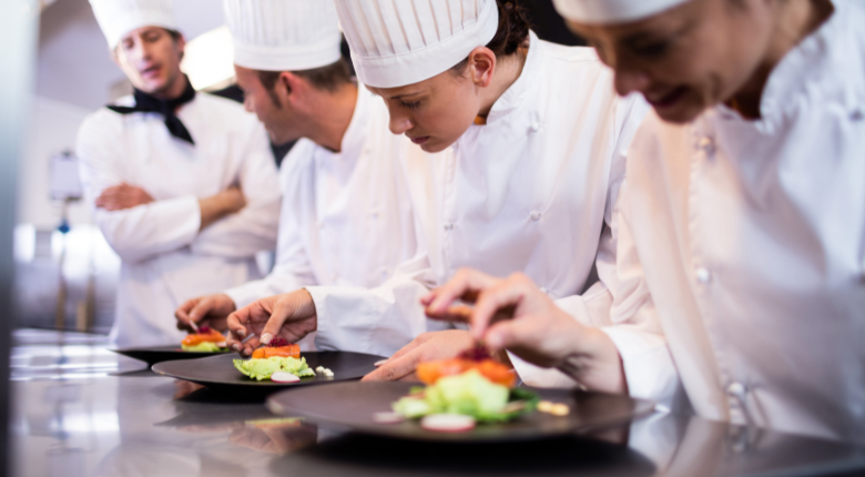 professional chefs experimenting in a test kitchen.