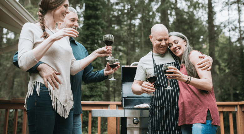 A group of adults enjoying a bbq wine pairing