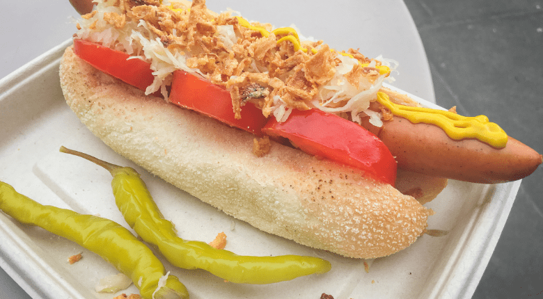 sauerkraut on a hot dog with chili peppers