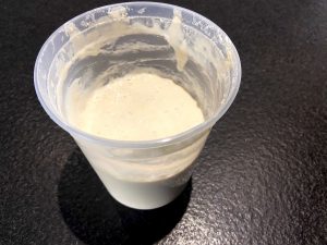 sourdough mix in a plastic cup