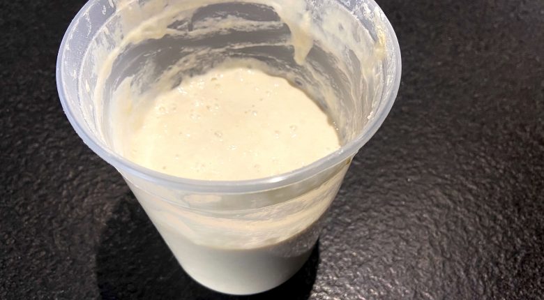 sourdough mix in a plastic cup