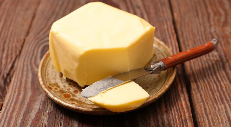 Butter in a plate with a knife