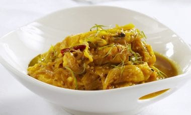 Ausgebackene Fischfiletstreifen in würziger Marinade