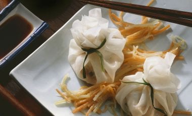 Fisch-Dim-Sum auf Gemüse