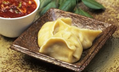 Gedämpfte Teigtaschen mit Fleisch gefüllt